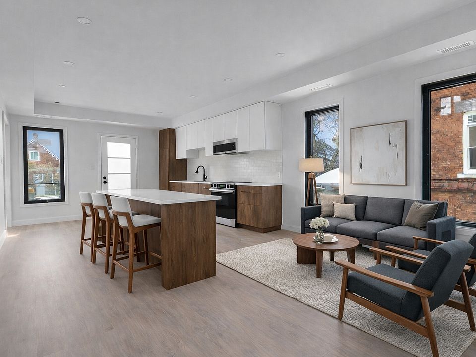 Open-concept living and kitchen at 77 Florence